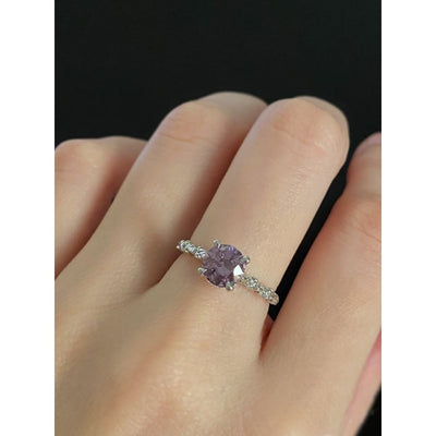 ARVERA- Purple sapphire engagement ring with diamond leaves