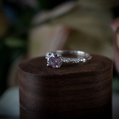 ARVERA- Purple sapphire engagement ring with diamond leaves