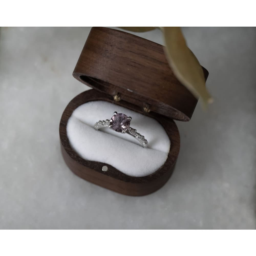 ARVERA- Purple sapphire engagement ring with diamond leaves