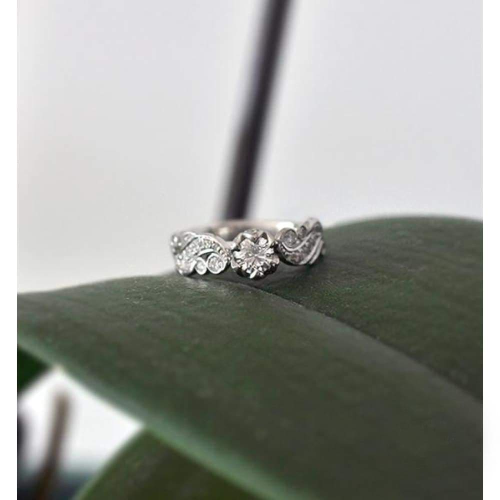 Diamond lotus flower engagement ring